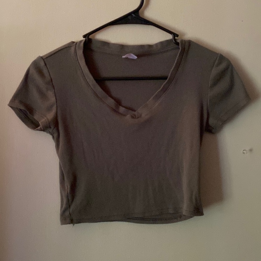 I’m selling a green crop top that is perfect for the summer time